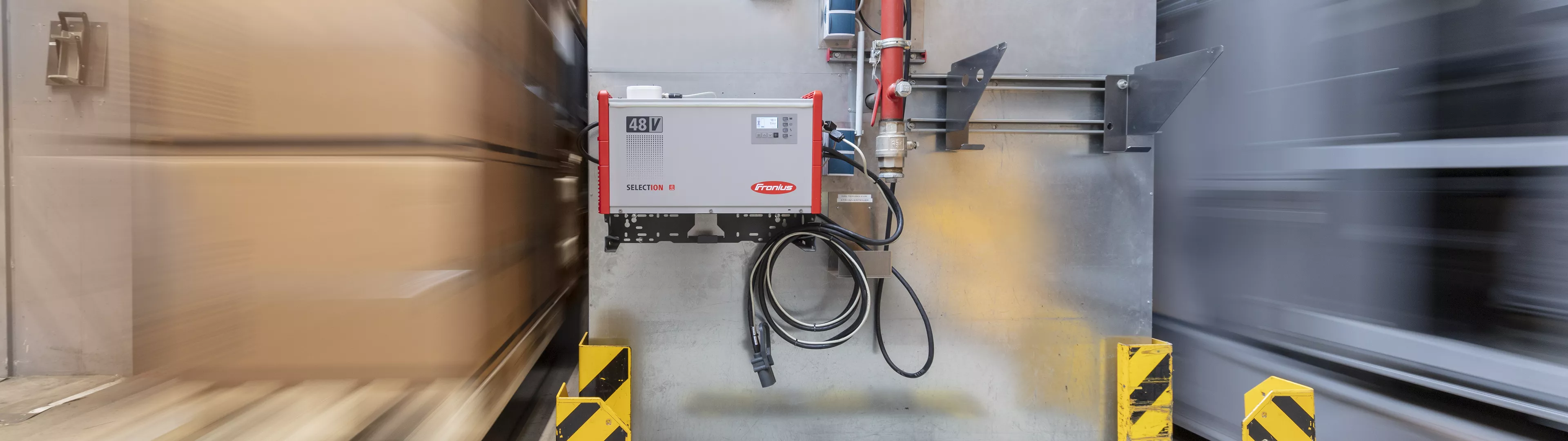 Fronius SelectION Lithium-ion forklift battery charger in use at a warehouse