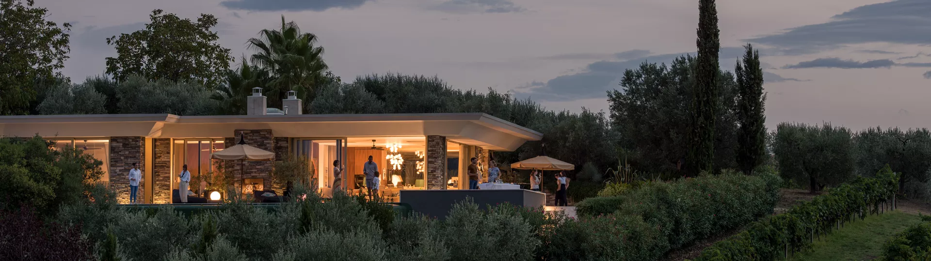 House with bright lights in the evening
